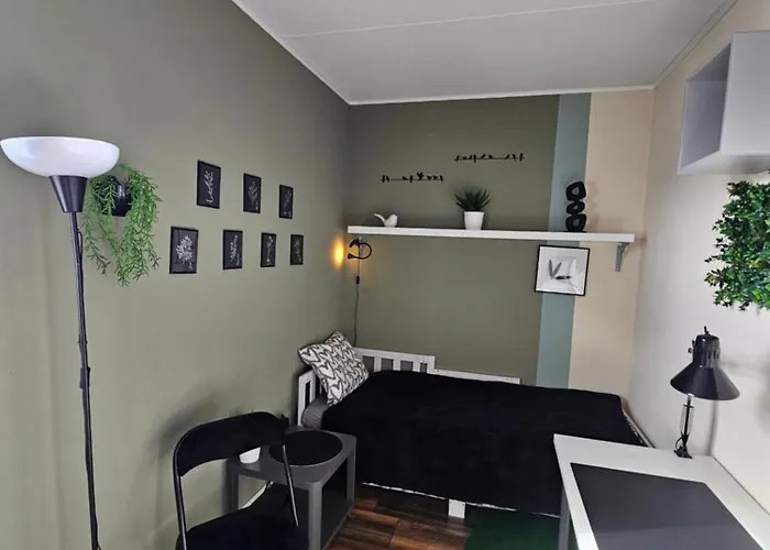 Den Haus Habitación en casa particular *